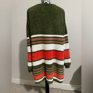 Women Cardigan multi color. Size: XS on the tag but fits SM, M, & L